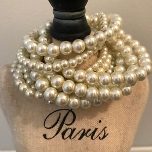 9 faux pearl bracelets